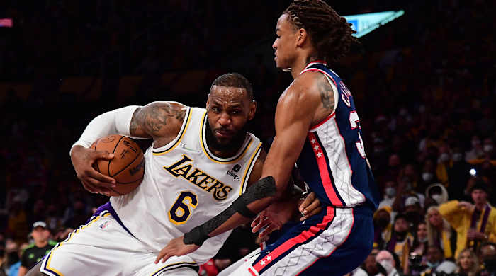 Los Angeles Lakers forward LeBron James (6) moves to the basket against Brooklyn Nets forward Nic Claxton (33) during the second half at Crypto.com Arena.